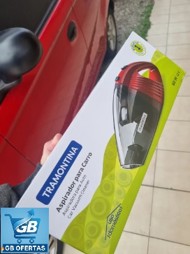 Destaca-se Imagem Enviada por Comprador do Aspirador Portátil Para Carro 12v 60w - Tramontina Segurando a Caixa