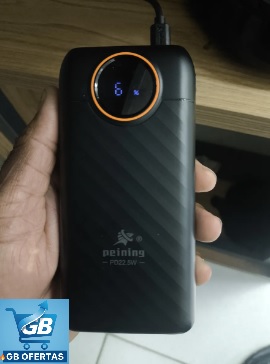 Destaca-se Imagem Enviada por Comprador do Carregador Portátil Power Bank Turbo 20000mah Universal Segurando na Mão