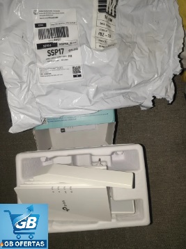 Destaca-se Imagem Enviada por Comprador do Repetidor de Sinal Wi-Fi 6 TP-Link na Embalagem