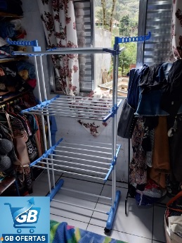 Varal De Chão Grande De Roupas 3 Andares Dobrável Real1 Destaca-se Imagem Enviada por Comprador do Cabide no Varal De Chão Grande De Roupas 3 Andares Dobrável Montado na Lavanderia